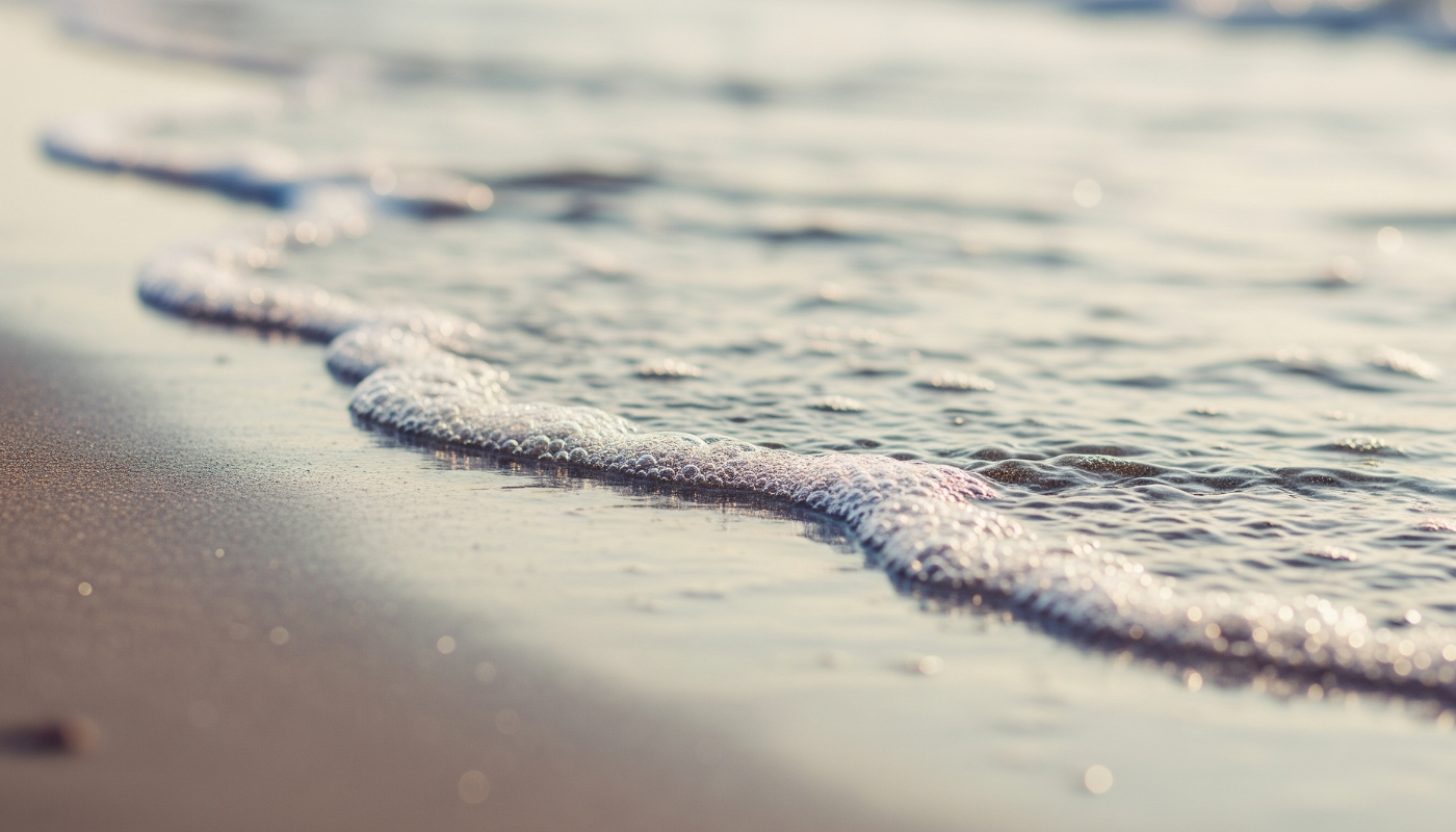 A picture of water at a beach in Jersey, Channel Islands.