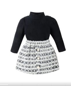 A chic two-piece girls' outfit, featuring a long-sleeved black ribbed polo neck top and a matching black and white tweed skirt with pearl buttons.