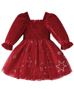 A little girl's festive Christmas dress in festive red, featuring a smocked bodice, long puff sleeves, and a tulle skirt with a white star and snowflake print.