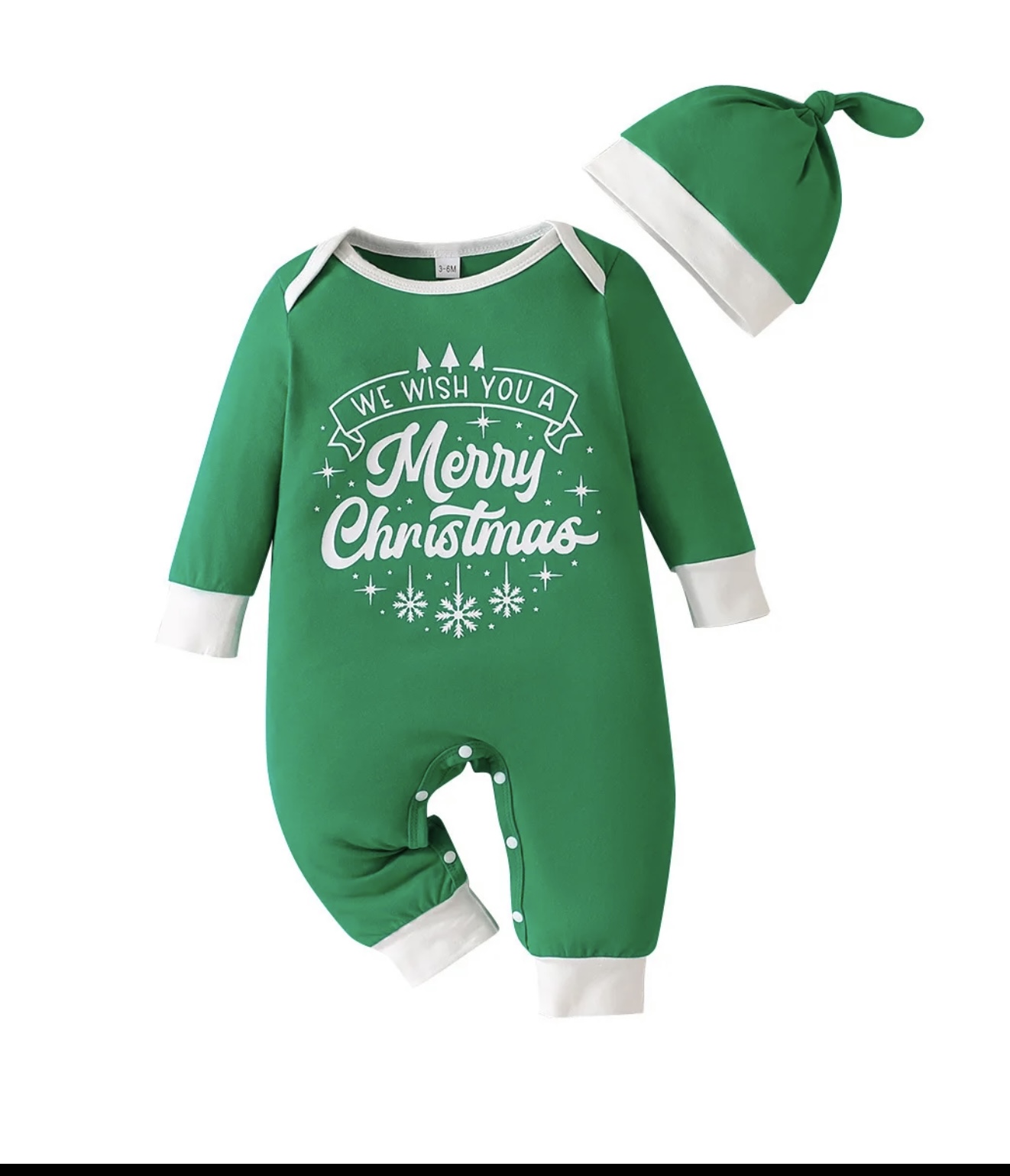 A festive green long-sleeved baby romper with "We Wish You a Merry Christmas" printed on the front, shown with a matching green and white knotted hat.