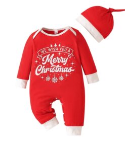 A festive red long-sleeved baby romper with "We Wish You a Merry Christmas" printed on the front, shown with a matching green and white knotted hat.